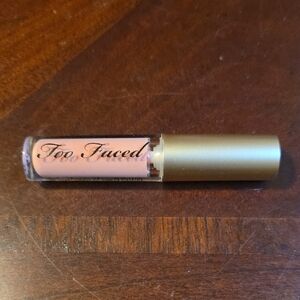 Too Faced Lip Gloss in Gold and Tan